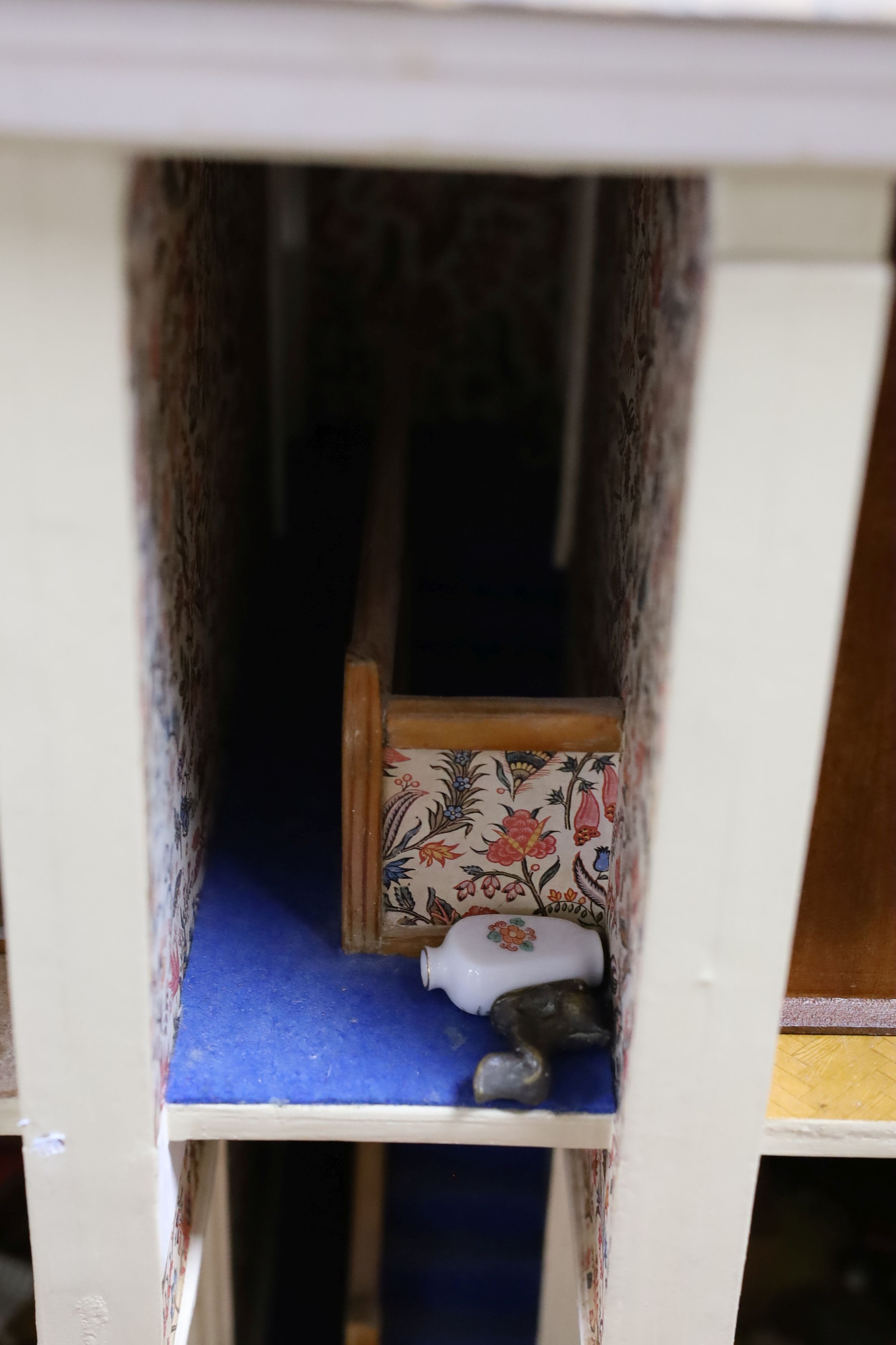 A dolls house, length 74cm, depth 39cm, height 66cm